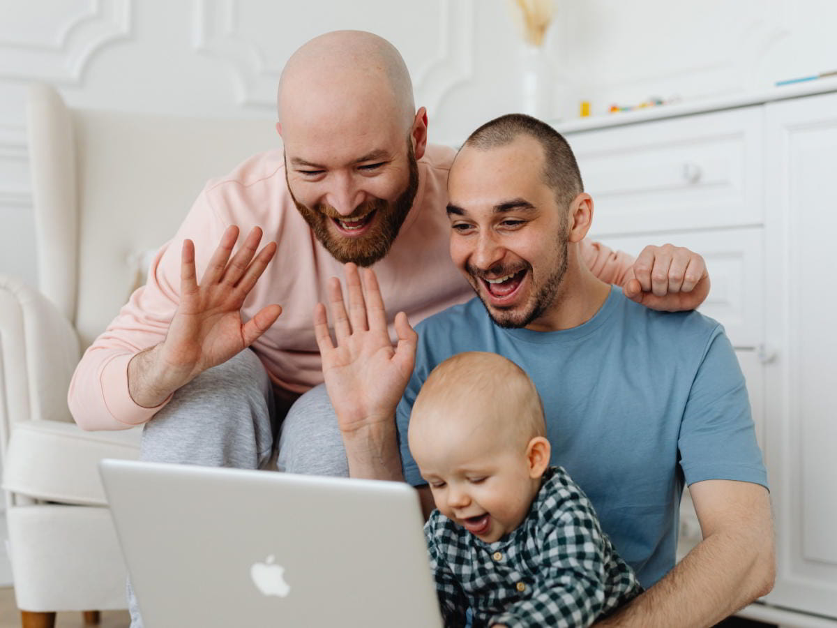 Same sex foster parents with a baby